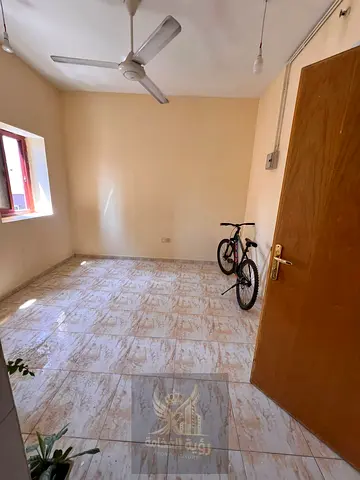 Studio for Annual Rent in Al Mujarrah, located directly next to the Corniche, in a convenient location close to essential services and facilities. Th