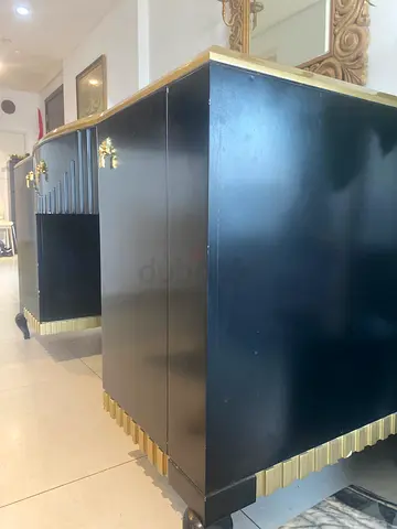 Black wooden wardrobe/armoire with gold trim - good condition