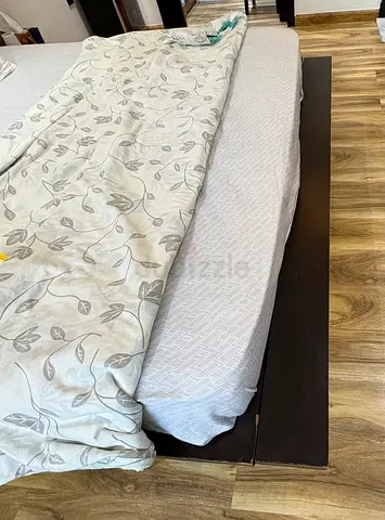 King wooden bed with storage (dark wood platform) - good condition. Bed made in India.