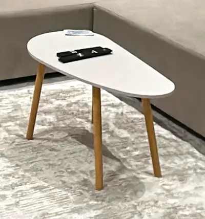 Mid-century modern white triangular side table with wooden legs