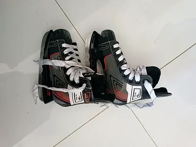 1 pair Inline skates and 2 pair ice skates
