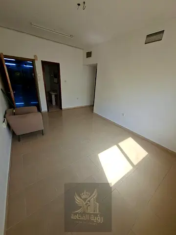 For rent in Al Butina, Sharjah. 2 bedrooms and hall, second tenant, central AC and gas, 2 bathrooms