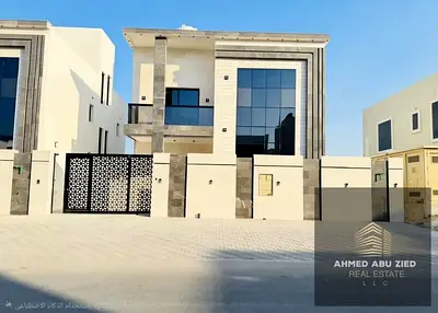 Luxury villa for annual rent in Al Amerah, Ajman. Features central air conditioning, a comprehensiv