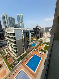 Bright 1BR Apartment | Azizi Riviera 48 | Balcony & City View