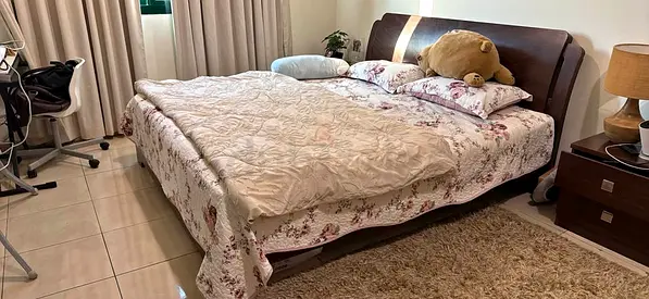Bed with mattress, vanity with shelf, cupboard closet and chest drawer