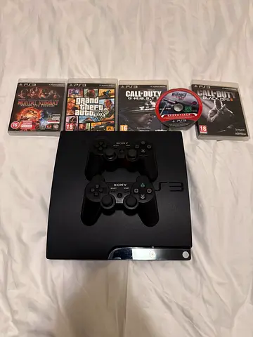 Sony PS3 Slim Original With 5 Games and 2 Controllers
