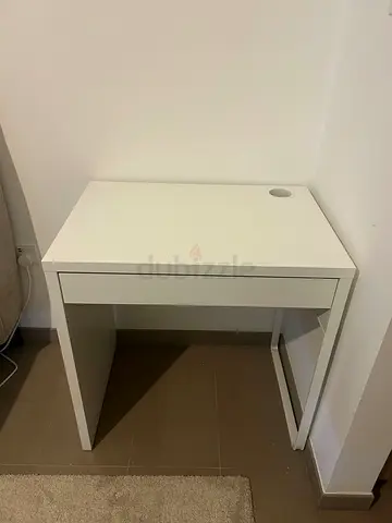 Small white study/computer desk with cable hole