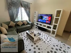 A furnished one-bedroom apartment with a living room is now available for monthly rent in Al Jurf 3,