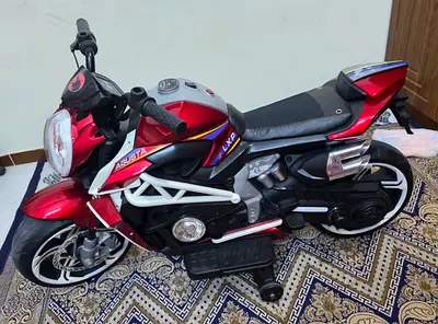 Kids Electric Ride-On Motorcycle - Red, Good Condition