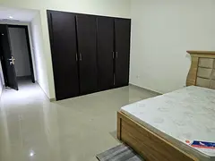 Room available in a 2BHK flat in Al Khail Gate for rent to couple or executive Bachelor