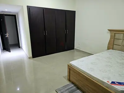 Room available in a 2BHK flat in Al Khail Gate for rent to couple or executive Bachelor