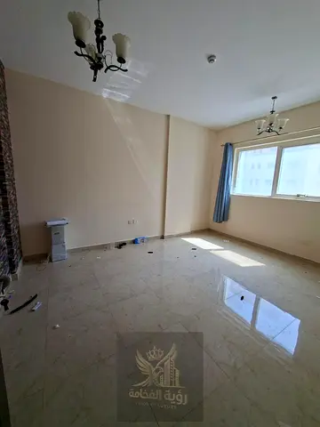 Apartment for Rent in Al Qulaya, Sharjah A two-bedroom apartment with a living room, suitable for families. The apartment offers a comfortable layout