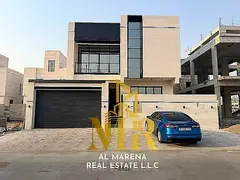 **Luxury Villa for Sale in a Prime Location in Al Bahia – Ajman | Ready for Immediate Occupancy** 