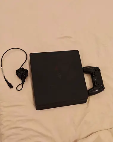 Used Sony PlayStation 4 Slim with DualShock 4 Controller