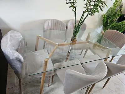 Glass Top Dining Table with 6 Upholstered Chairs - Light Wood Frame