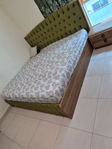 Super king bed with side table