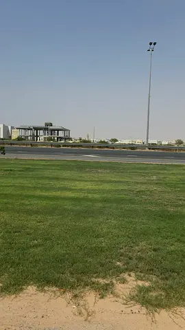 Commercial plot for sale in Al Tay Commercial Project (Al Raqiba Commercial), located directly on Emirates Road in the Al Suyoh district, Sharjah.