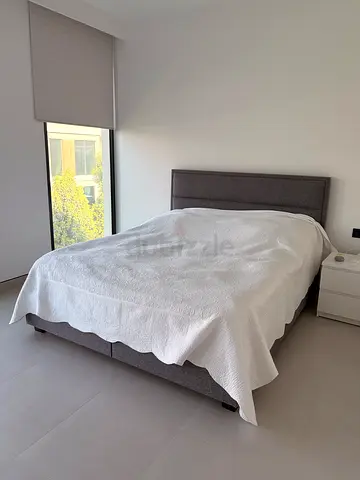 Grey fabric double bed frame with headboard - good condition