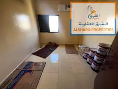 Staff accommodation: one room, living room, and balcony; new A/C; near Ajman Corniche; 28,000.