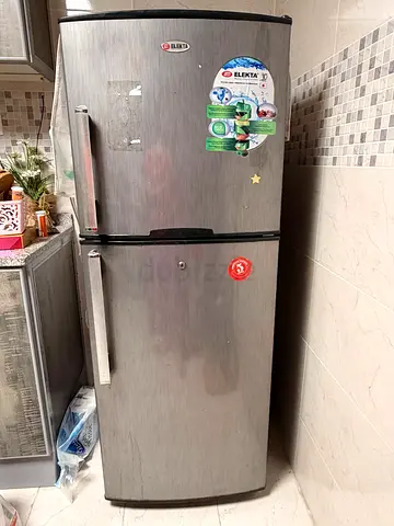 Used double-door refrigerator in good working condition
