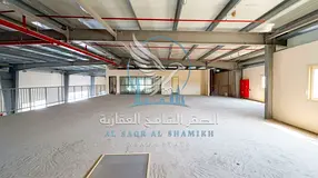 Factory for rent in Sajaa Al Jalil, 55,000 sq ft, 30,000 sq ft warehouse, 10 labour rooms, 10 bathro