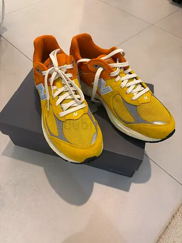 Yellow New Balance 2002 running sneakers, size available