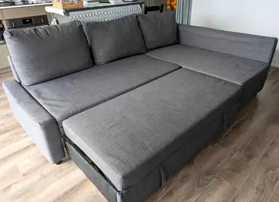 Grey L-shaped Sofa Bed with Storage - Good Condition