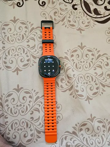 Samsung Galaxy Watch5 (Black) with Orange Silicone Strap - Good Condition