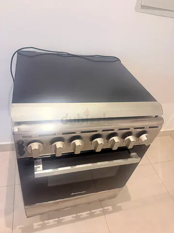 Used freestanding cooker with oven and 4 burners - good working condition