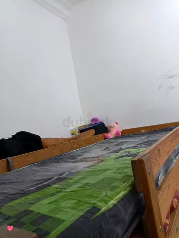 Sturdy wooden bunk bed frame with mattress
✅ Good condition