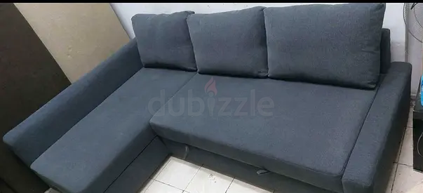 Dark grey L-shaped sectional sofa - good condition