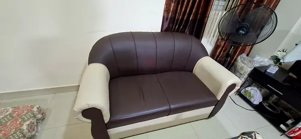 sofa in good condition use less than 1 year urgent sale - 200 aed only
