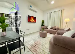 An exceptionally luxurious and upscale one-bedroom apartment with a living room, featuring brand-new