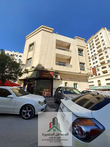 For Sale: Building in Al Majaz, corner plot, Ground + 2 floors.
