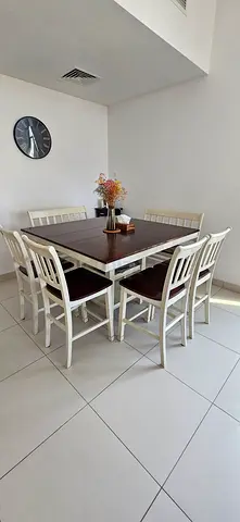 High square 8+ seater Dining table from united furniture