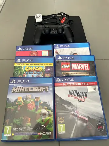 PlayStation 4 slim 500 GB with controller and 6 PS4 games