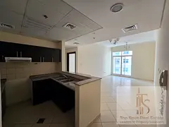 Spacious 1BR Apartment | Mazaya 7 Liwan | Balcony & City Views