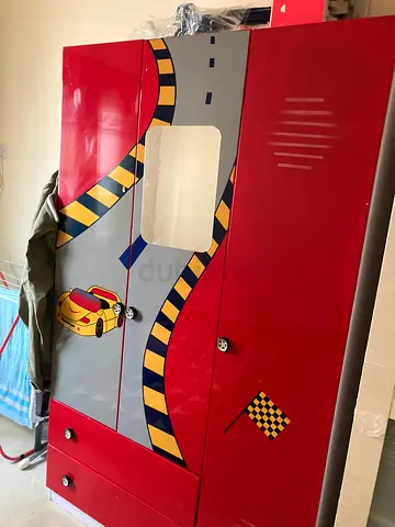 Red children's wardrobe with car design - good condition