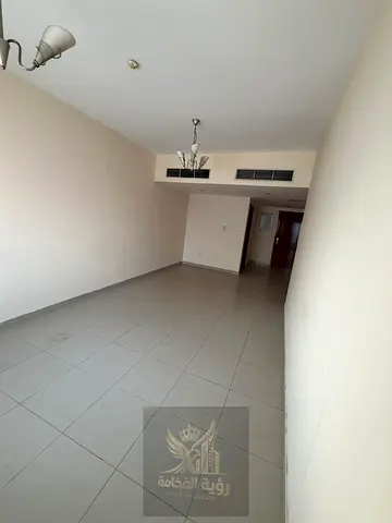 For rent in Al Majaz 2, 2 bedrooms and hall, including a master bedroom, 3 bathrooms, balcony and p