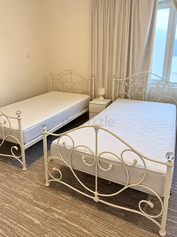 Pair of White Metal Single Beds with Mattresses