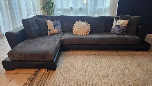 L-shaped grey fabric and leather corner sofa - good condition