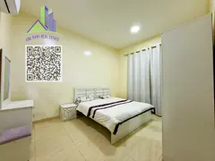 An exceptionally luxurious and upscale one-bedroom apartment with a living room, featuring brand-new