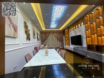 Luxury 2BR apartment for sale in Ajman One Towers with VIP finishing and parking. Down payment AED 330,000, monthly AED 7,826, total AED 790,000.