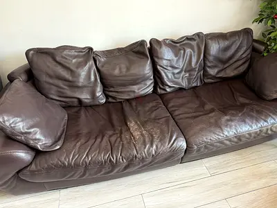 Brown three-seater leather sofa, used — good condition Pure leather