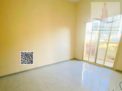 Apartment for rent: one bedroom and a living room, central air conditioning, prime location in Ajman (Al Rashidiya 2, Al Qasim Building).
