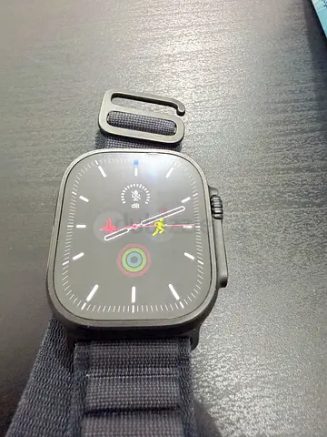 Used Apple smartwatch with fabric strap - perfect condition as new