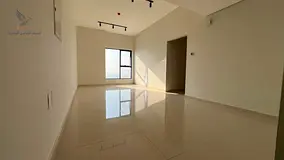 A twobedroom apartment with a living area located in a new luxurious tower It features a private gym