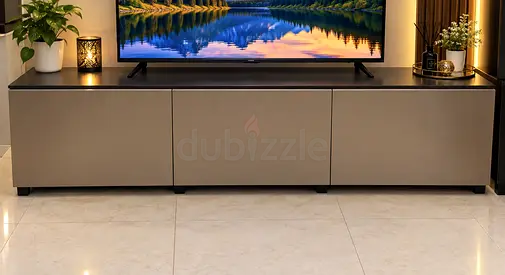 Modern low-profile TV cabinet / entertainment unit in beige finish