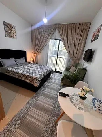 Studio for monthly rent with hotel-style furnishing, internet, and parking in Maryam Island, Al Khan, Sharjah.
