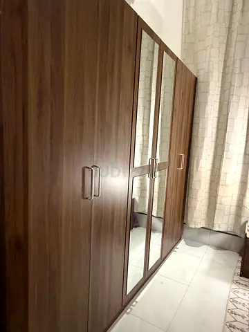 Wooden Wardrobe 6 doors with Mirror with dresser and 2 night stands- Good Condition under warranty